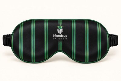 Schwarze Moodsup Schlafmaske mit grünen Streifen und Kolibri-Logo